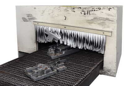 Heat Sink Components Moving Through Automated Processing Equipment